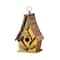 Glitzhome® 9.5" Yellow Distressed Wood Birdhouse with Leaves